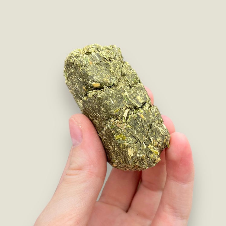Premium timothy hay cubes for small pets.