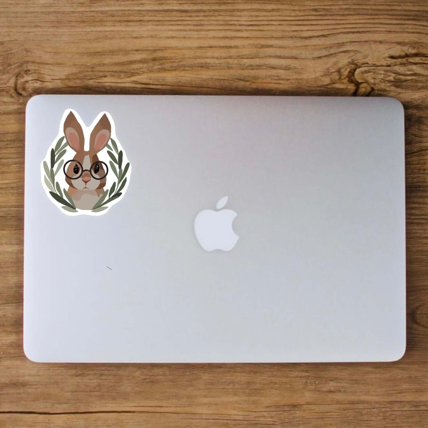 vinyl sticker of a cute rabbit wearing funny glasses shown on a laptop